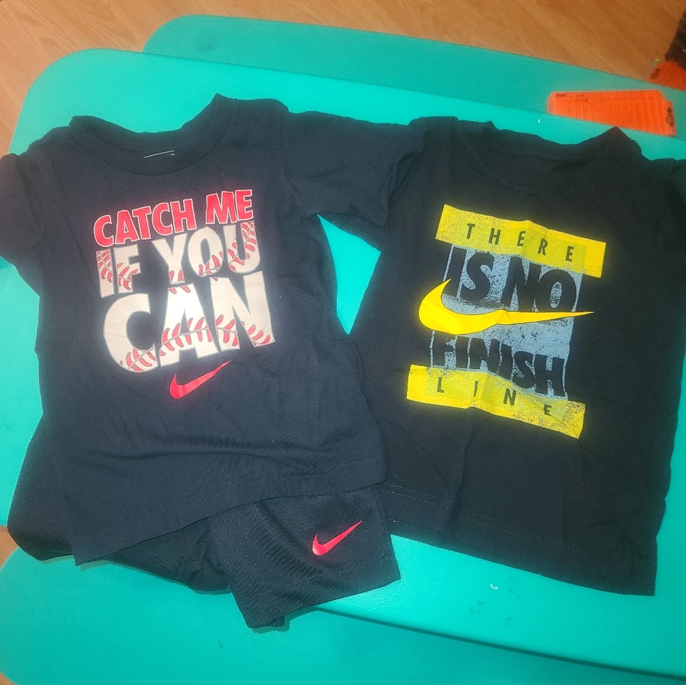 2 Nike shirts and a pair of shorts